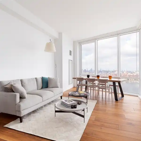 AN EXPANSIVE CONDO SOAKING IN RIVER VIEWS