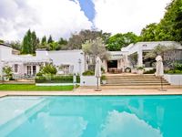 LUXURY UNFOLDS IN THIS ELEGANT AND STATELY RESIDENCE REFINED BY PERSONAL STYLE