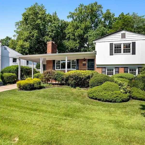 BAY WINDOW BEAUTY WITH SUNROOM AND TREE VIEWS