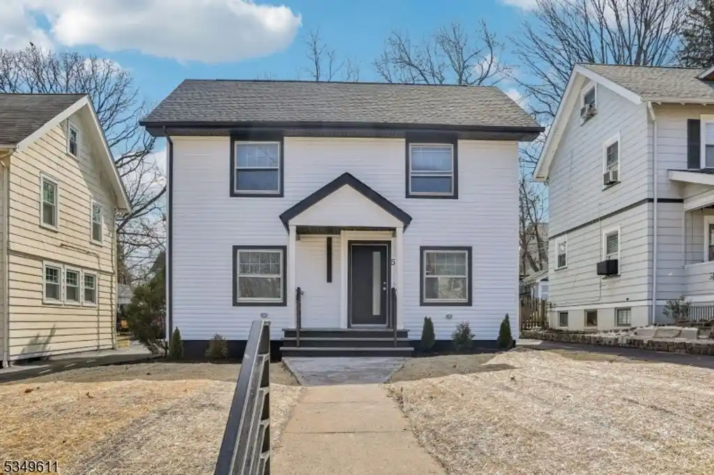 Charming Expanded Colonial Home