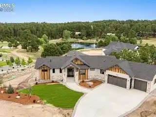 Exquisite Modern Retreat on Premier Pond-side 1-acre Lot