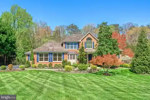 Elegant Brick Estate with Heated Pool & Spa