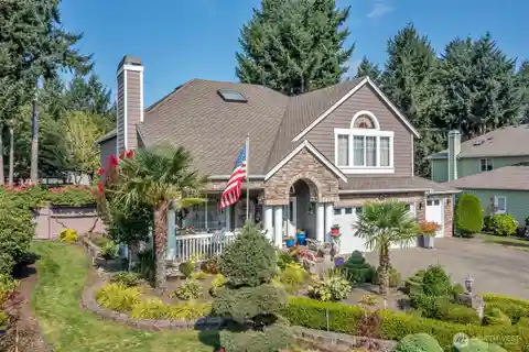 Stone-Accented Home Featuring Hot Tub