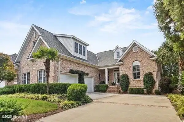 METICULOUSLY MAINTAINED BRICK RESIDENCE IN LANDFALL