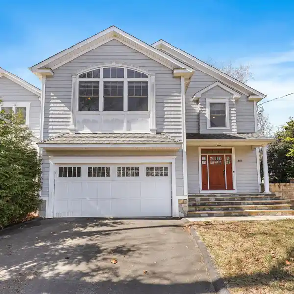 BEAUTIFULLY DESIGNED COLONIAL-STYLE HOME