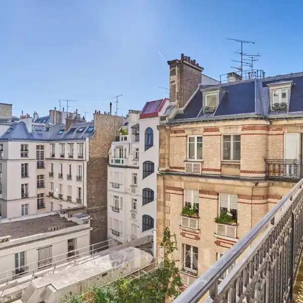 SUNLIT TURN-OF-THE-CENTURY APARTMENT WITH GRAND SALON