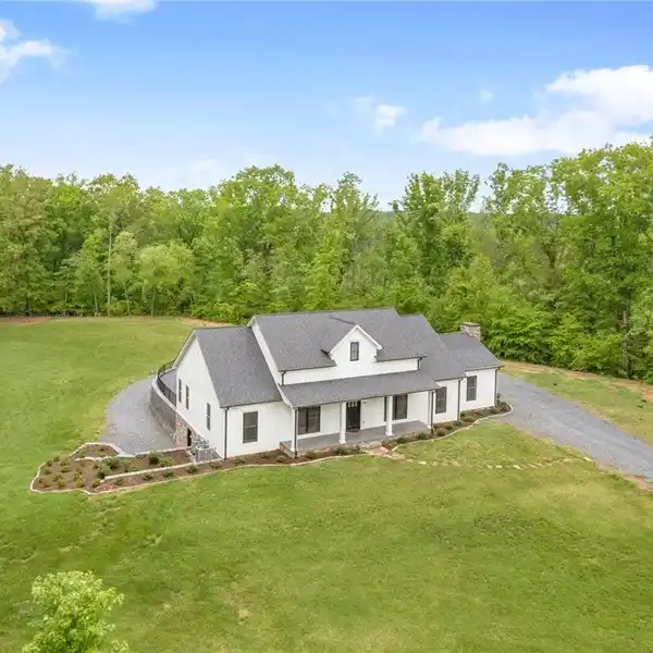 CUSTOM HOME ON OVER 15 ACRES