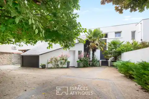 Architect-Designed Haven Surrounded by Lush Garden