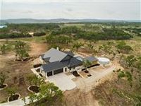 BEAUTIFUL NEW HOME ON FIVE ACRES