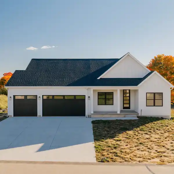 MODERN WEST TRAVERSE CITY HOME WITH QUARTZ COUNTERS & SHIPLAP FIREPLACE