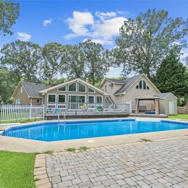 YEAR-ROUND ENTERTAINER'S DREAM ON A WATERFRONT LOT