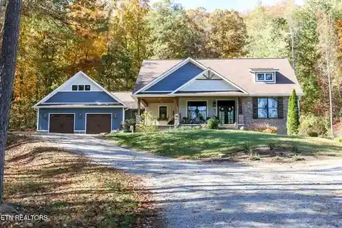 Stunning Custom Home on Five Private Wooded Acres