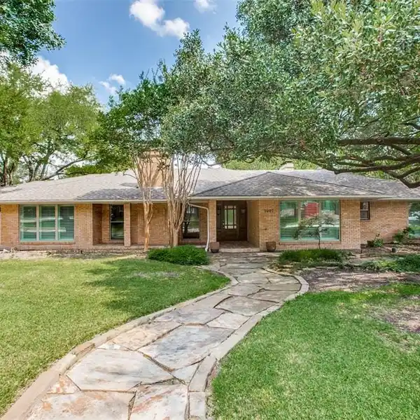 UPDATED HOME ON A LARGE CORNER LOT