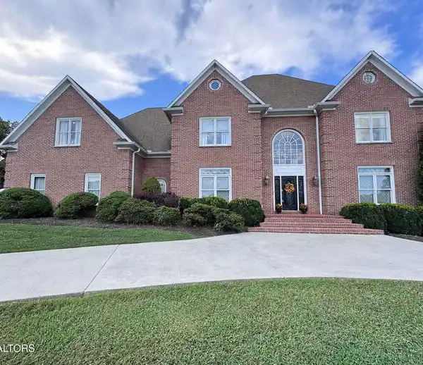 STATELY ALL-BRICK HOME ON A PROMINENT CORNER