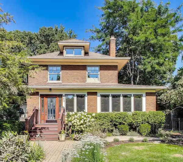 BEAUTIFUL UPDATED BRICK HOME IN WALK-TO-TOWN LOCATION