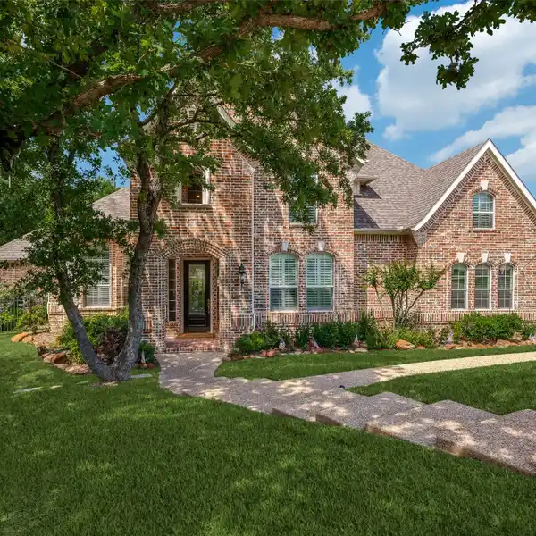RECENTLY REMODELED CUSTOM ESTATE IN A GATED COMMUNITY