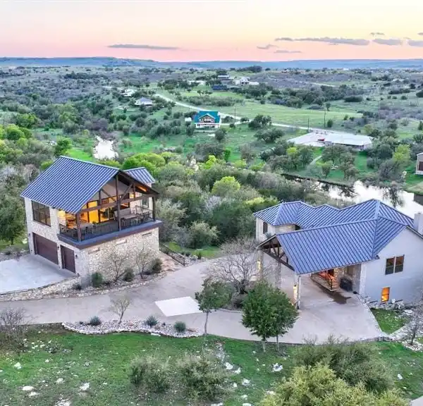 CUSTOM WATERFRONT HOME IN PRESTIGIOUS SPORTSMANS WORLD AT POSSUM KINGDOM LAKE