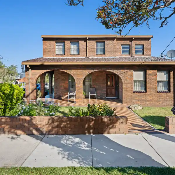 CHERISHED HOME IN COMMANDING CORNER POSITION