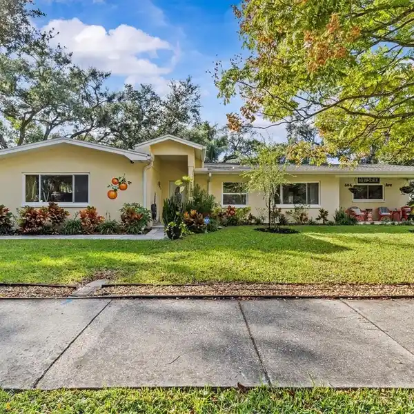 SPACIOUS CORNER LOT WITH MATURE GRANDFATHER OAKS