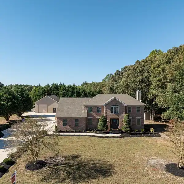 EXCEPTIONAL MULTIGENERATIONAL HOME NESTLED ON A PRIVATE LOT