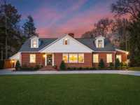 RENOVATED HOME ON A LARGE FLAT LOT