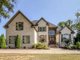 Custom-Built Luxury with Private Poolside Retreat