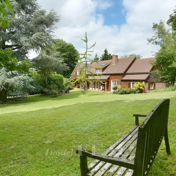 SUN-FILLED ESTATE STEPS FROM TOWN
