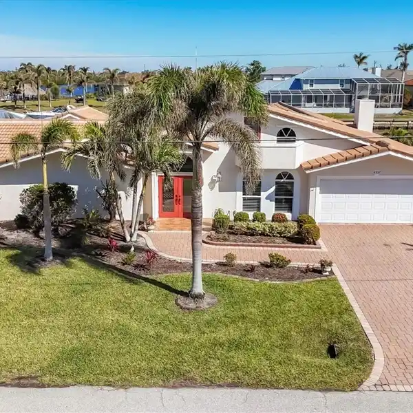 SPACIOUS CANAL-FRONT FIVE BEDROOM HOME