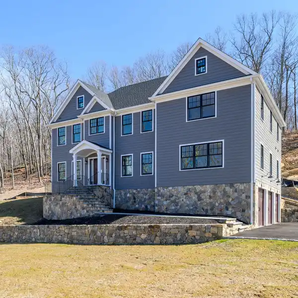 BRAND NEW LUXURY HOME ON OVER THREE ACRES AT WOLF POND ESTATE