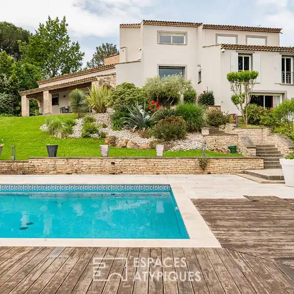 EXCEPTIONAL HOME IN A SERENE GREEN SETTING