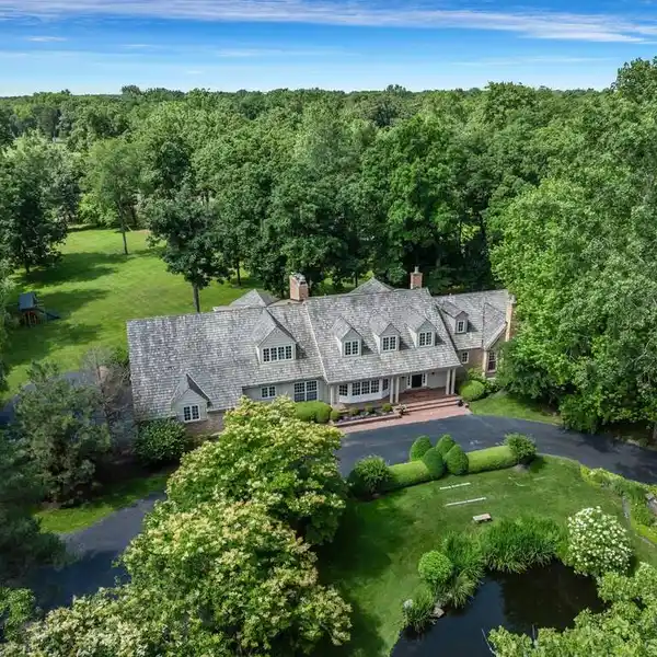 EXCEPTIONAL HOME ON OVER THREE ACRES