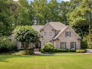 Timeless White Columns Home with Scenic Porch