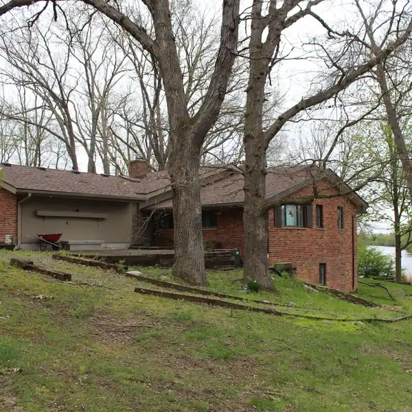 AMAZING HOME ON OVER THREE WOODED ACRES