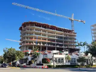 Contemporary Grandeur with a Waterfall-Edge Island