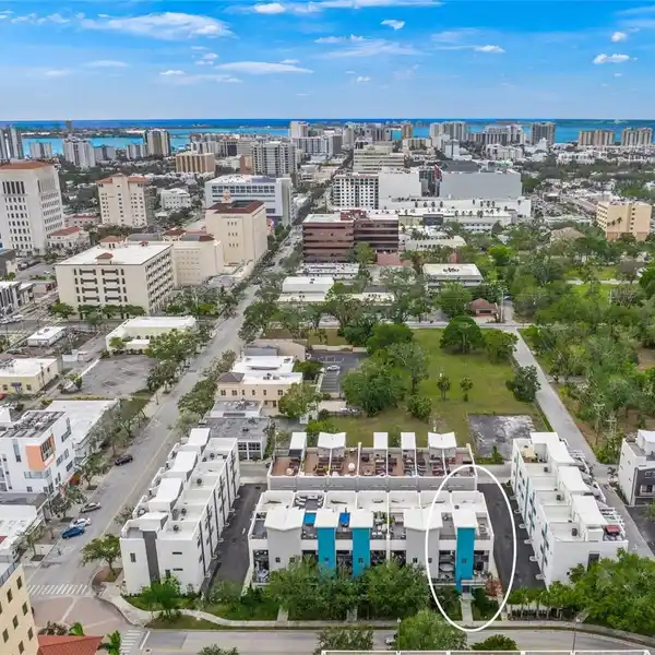 PRISTINE END UNIT TOWNHOUSE IN THE HOT UPTOWN DISTRICT