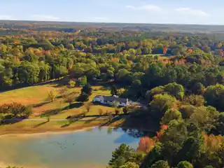 Southern Charm Meets Luxury on Stocked Pond