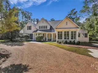 Idyllic Tucked Away Home Surrounded by Evergreens