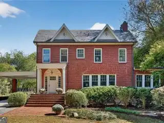 Stately Estate with Timeless Elegance and Cascading Waterfall