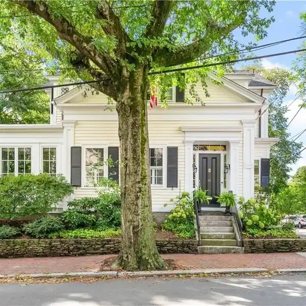 SPACIOUS GREEK REVIVAL WITH TWO PRIMARY SUITES AND PRIVATE GUEST QUARTERS