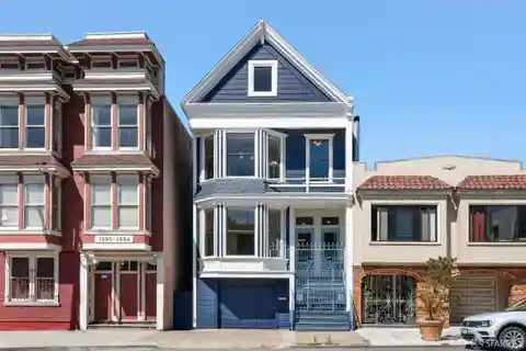 Elegant Edwardian Duplex with Sun-Filled Rear Deck