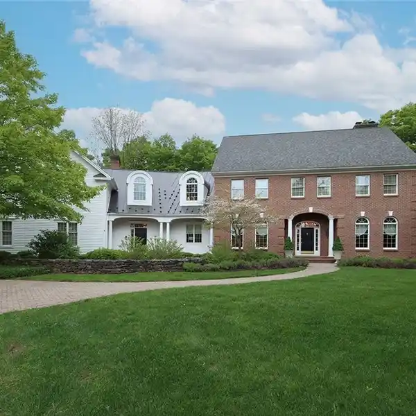 TIMELESS ESTATE LIVING IN PRESTIGIOUS WATERFORD WOODS