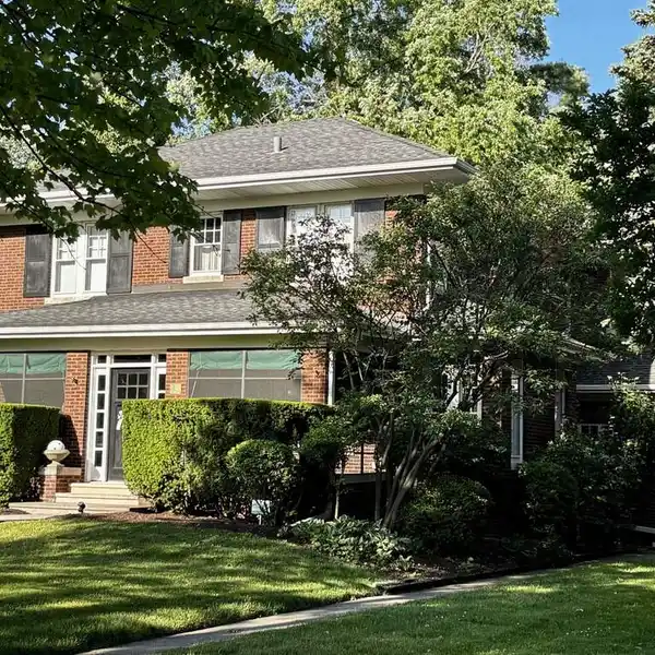 CENTRAL RIVER FOREST HOME ON A STATELY BLOCK