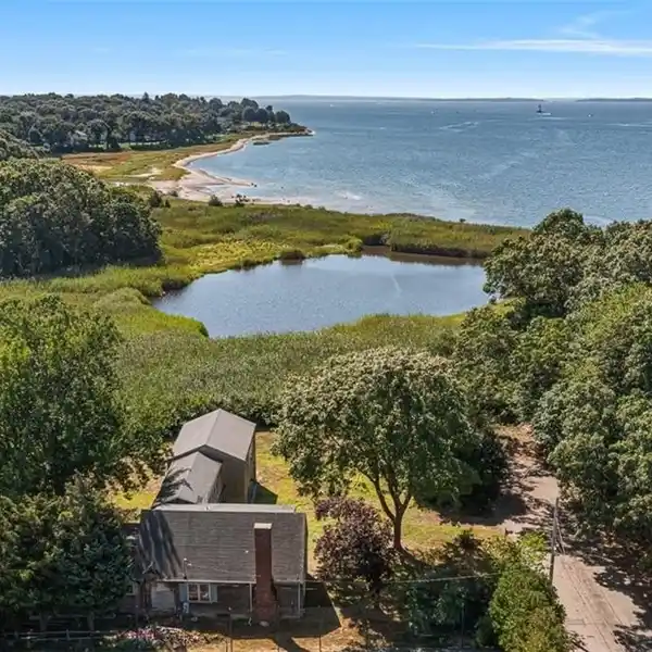RARE WATERFRONT OPPORTUNITY WITH CONSERVATION VIEWS & SUNSET VISTAS