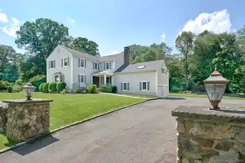 Unique Colonial Home on a Level Corner Lot