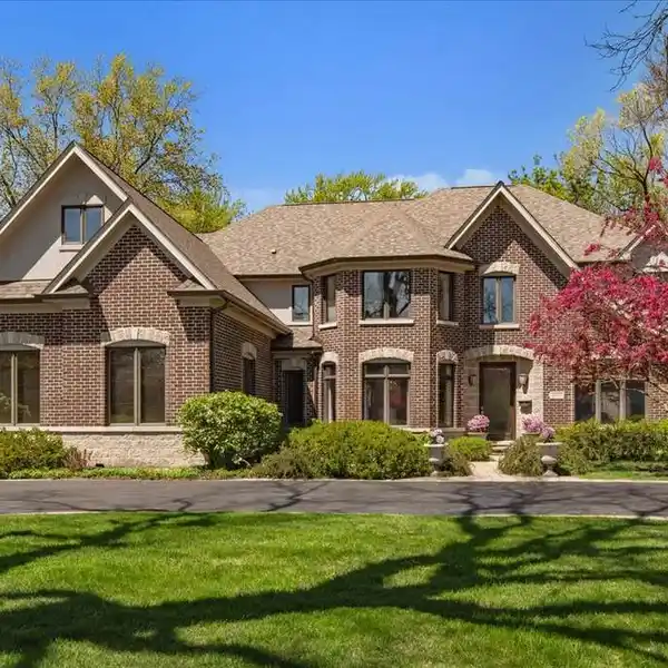 BRICK AND STONE CUSTOM HOME ON AN AMAZING HALF-ACRE