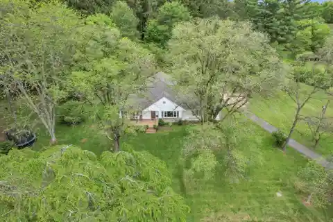 Elegant Custom Home on 9+ Private Acres