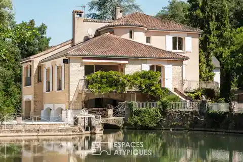 Exceptional Riverside Property with Multiple Guest Homes