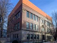 EXPANSIVE BUILDING OFFERING MANY POSSIBILITIES