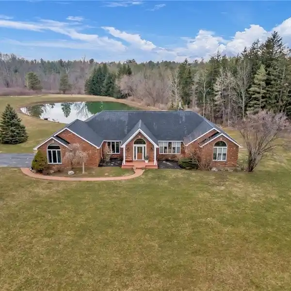 SPRAWLING BRICK RANCH ON 17 ACRES