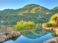 EXCEPTIONAL HOME NESTLED ON RIDGE WITH BREATHTAKING VIEWS AND MOUNTAIN VISTAS